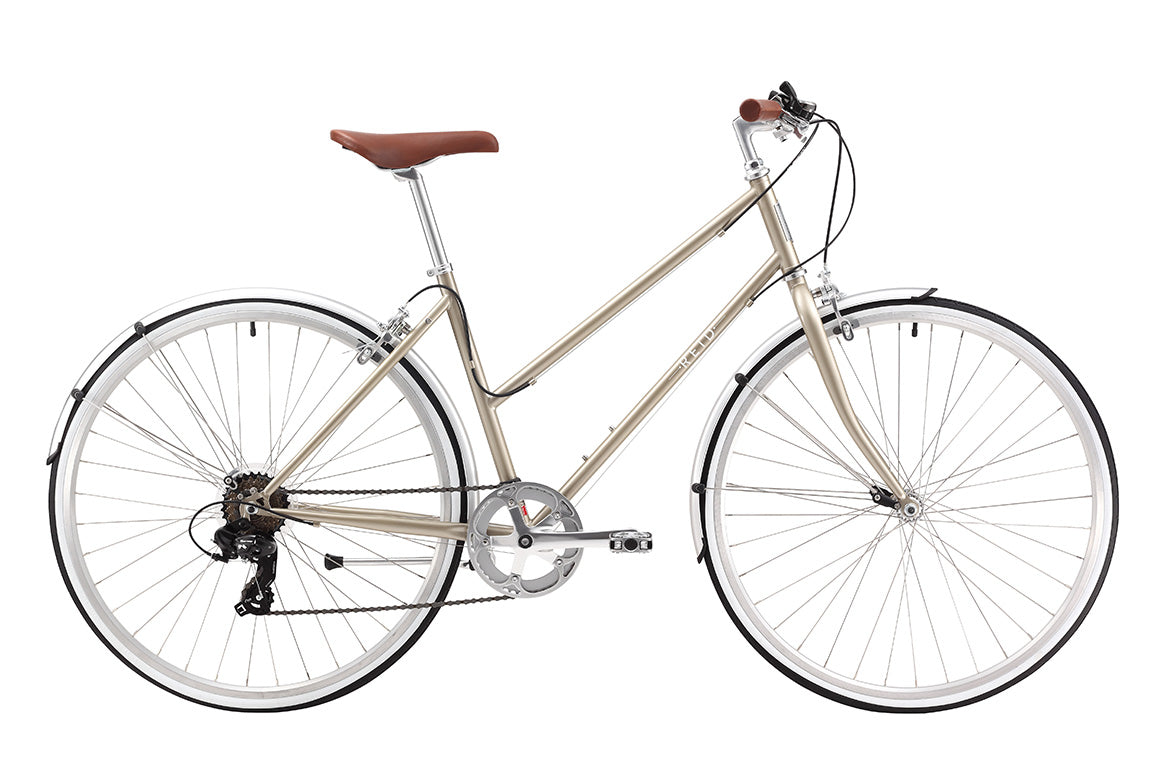 Vélo urbain femme REID Ladies Esprit 28" – Champagne – Taille M – 7 vitesses – Style élégant & performance